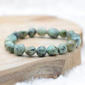 Bracelet roulé "Positif" en Turquoise Verte