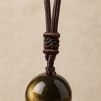 Détail du nœud macramé coulissant du pendentif - lespierresdubienetre